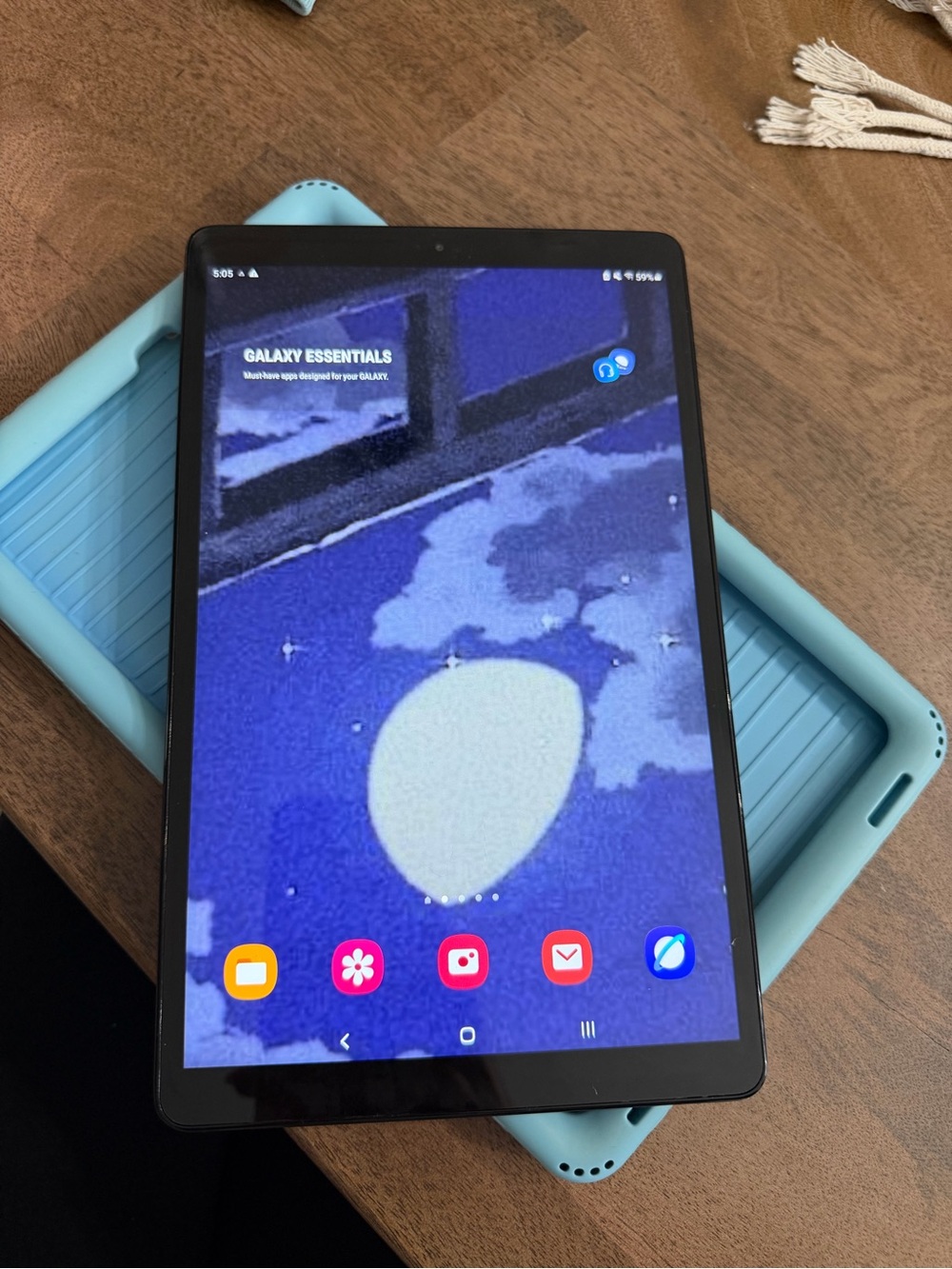 Samsung Tablet with Light Blue Protective Case